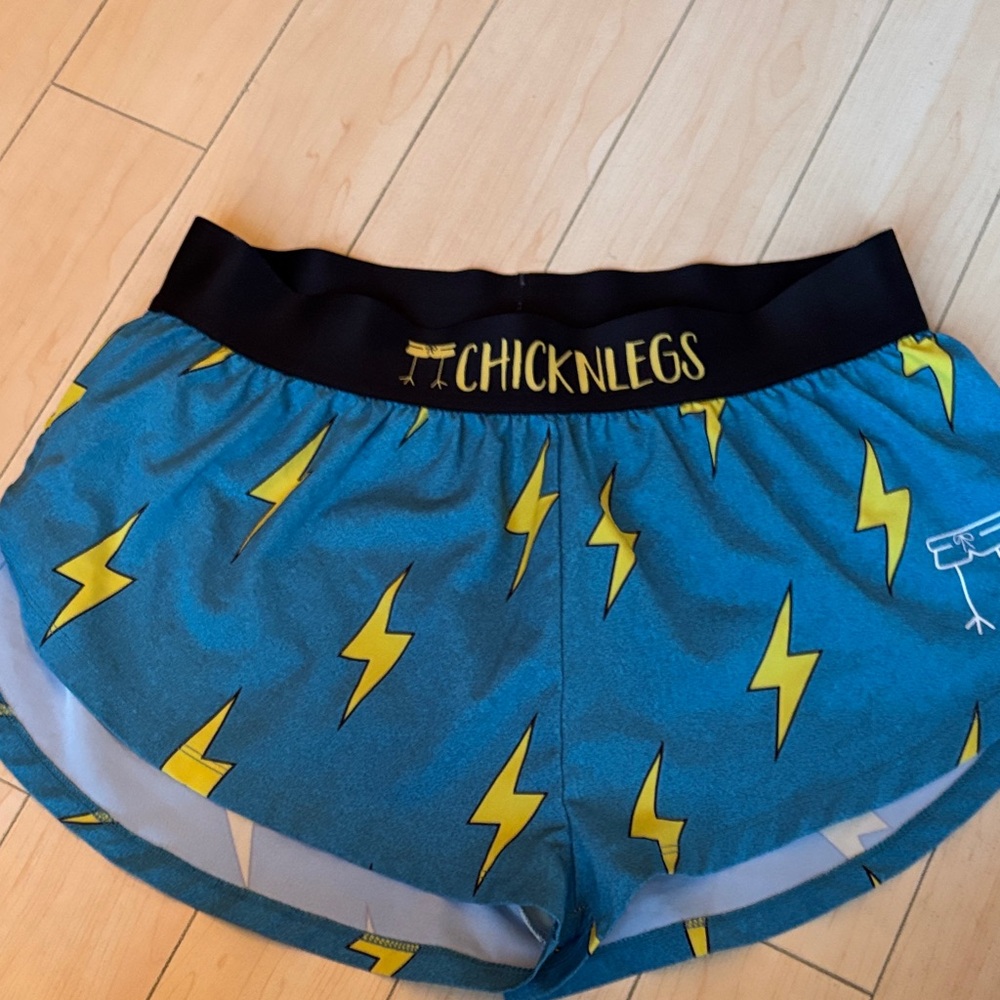 ChicknLegs Women's Athletic Shorts - Blue with Yellow Lightning. Women’s medium